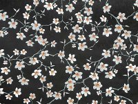 Tissu 100% coton fleurs d'amandier sur fond noir 150 cm de large