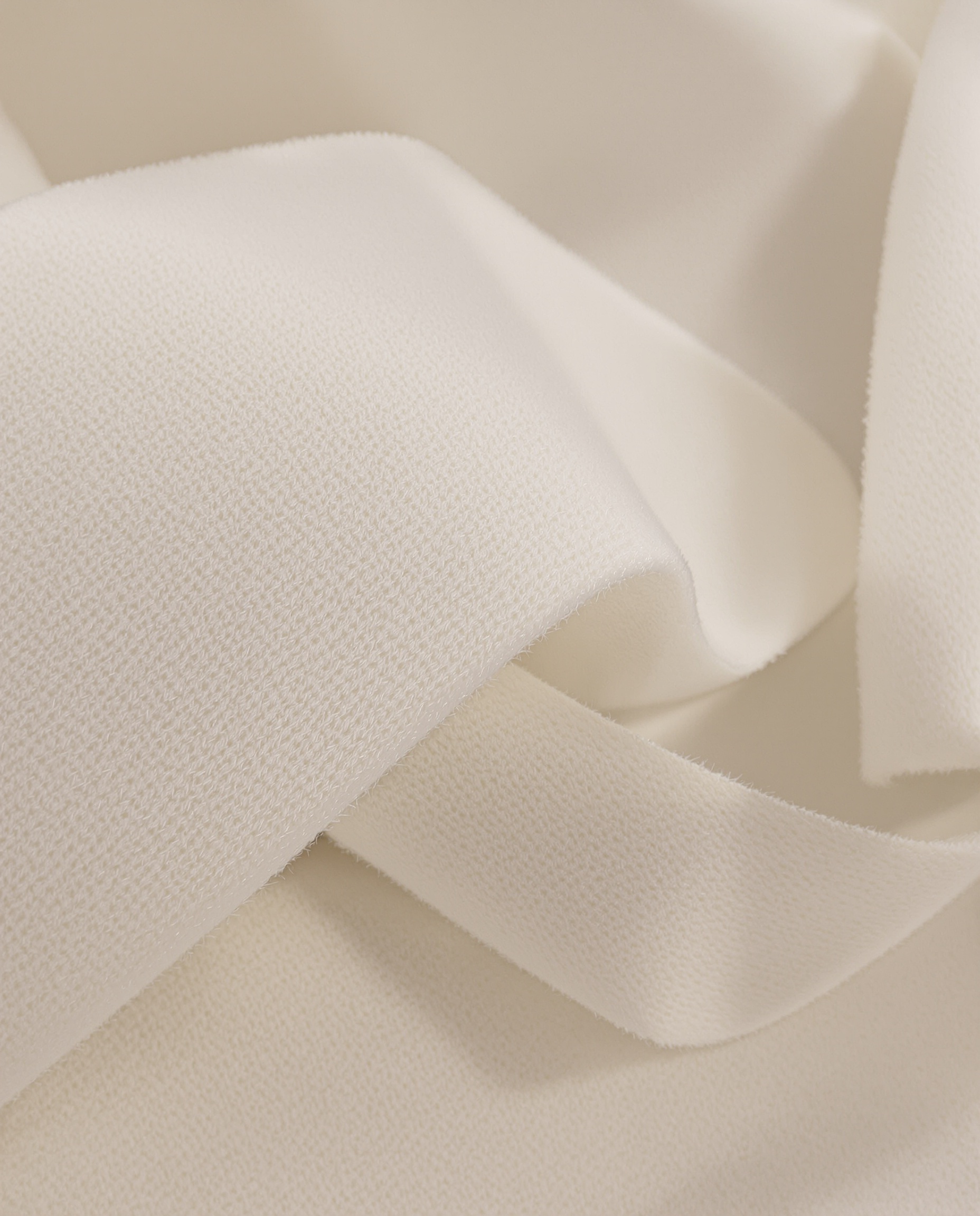 Zoom sur une flanelle haut de gamme : trame serrée et duvet doux.